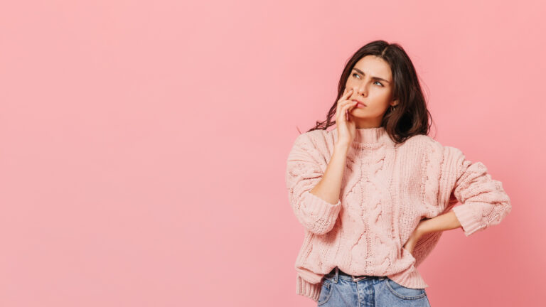 Young woman is thinking about something